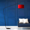 curved floor lamp with red shade