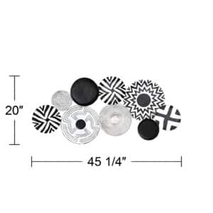 handcrafted abstract metal wall art featuring white and black discs with multi-pattern designs.